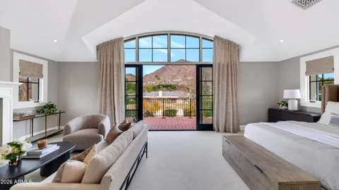 a bathroom with a granite countertop sink toilet a mirror and shower