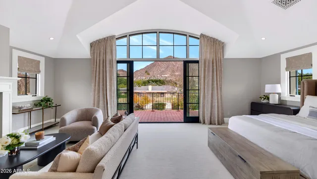 a bathroom with a granite countertop sink toilet a mirror and shower