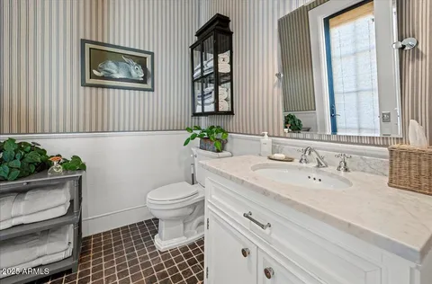 a bathroom with a sink and a toilet