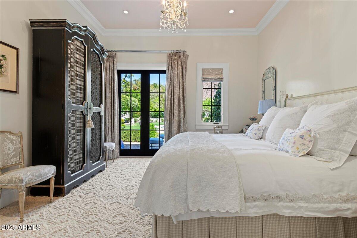 5446 East Exeter Boulevard Phoenix, AZ 85018 - Photo 32 of 59 a bedroom with a large bed and a window