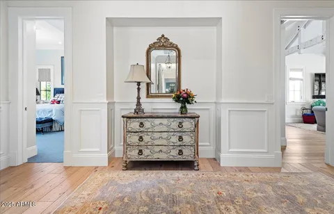 a living room with furniture a potted plant and a potted plant