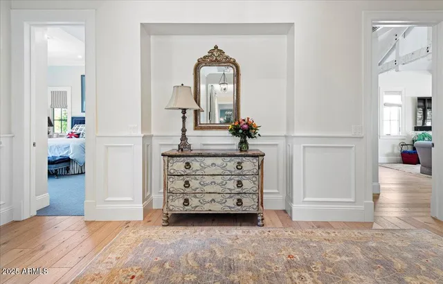 a living room with furniture a potted plant and a potted plant