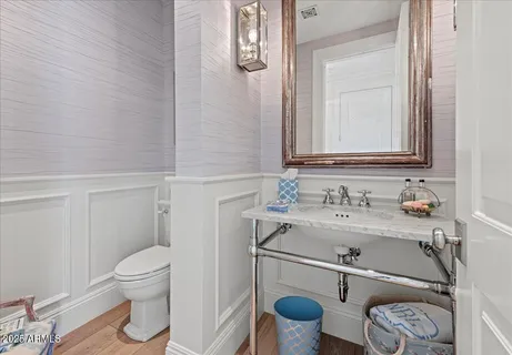 a living room with furniture or couch and a potted plant