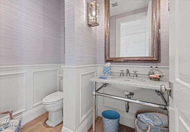 a living room with furniture or couch and a potted plant