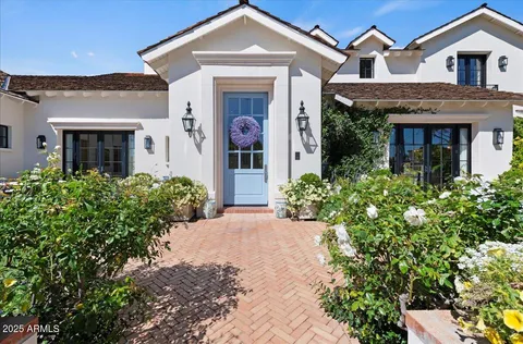 front view of a house with a small yard