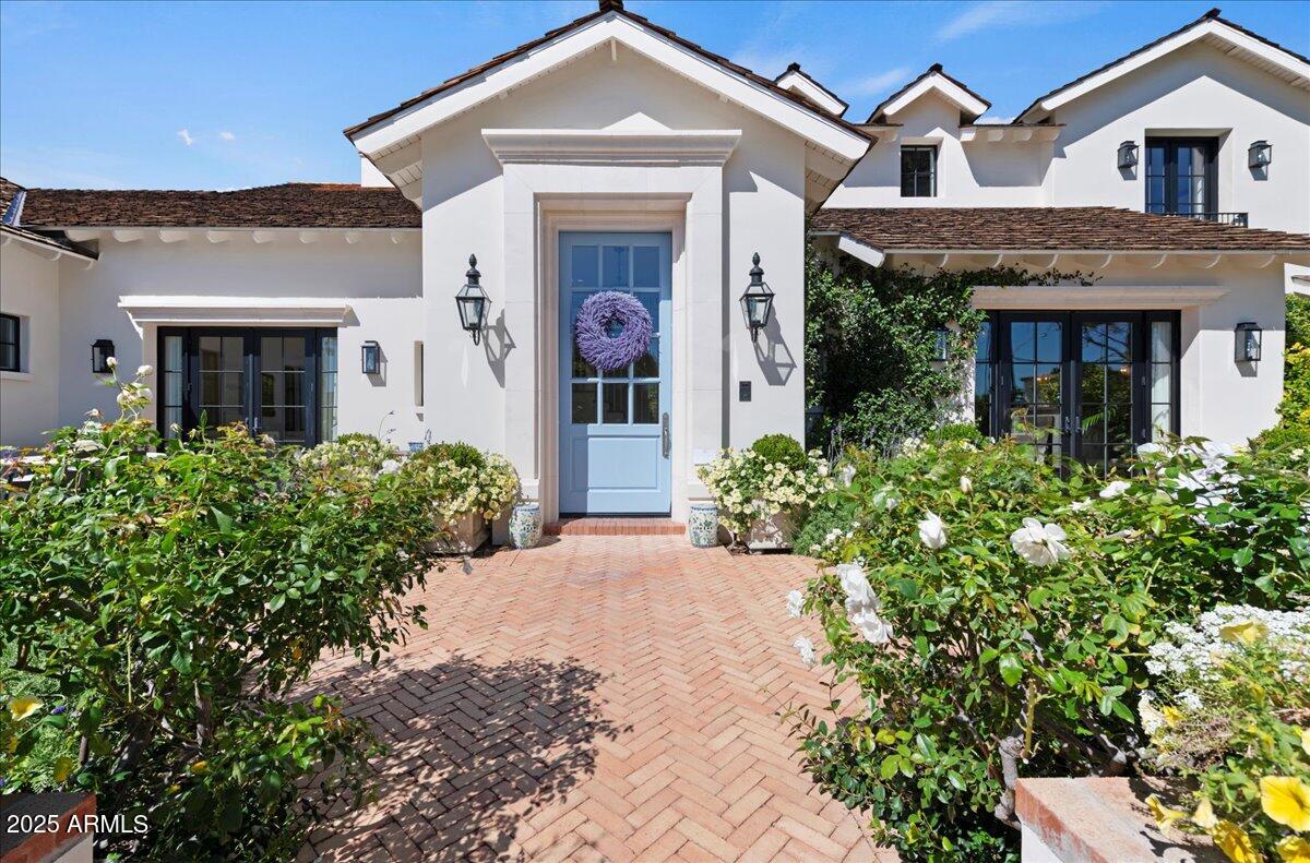 5446 East Exeter Boulevard Phoenix, AZ 85018 - Photo 4 of 59 front view of a house with a small yard