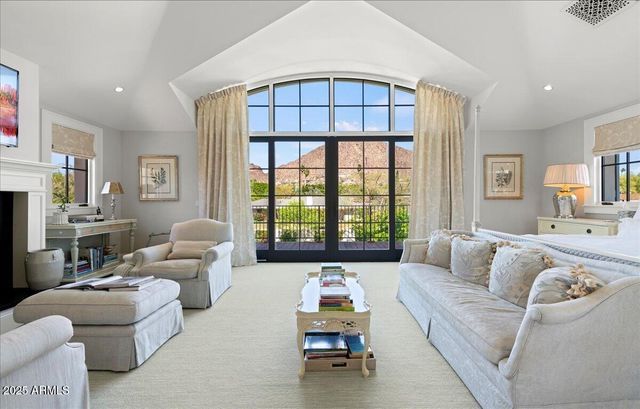 a spacious bathroom with double sink and a mirror