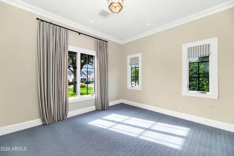 a view of a patio with table and chairs and potted plants
