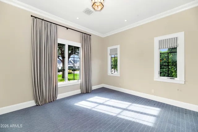 a view of a patio with table and chairs and potted plants