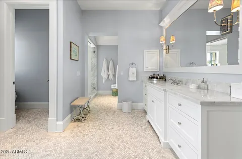 a kitchen with stainless steel appliances a stove and a refrigerator