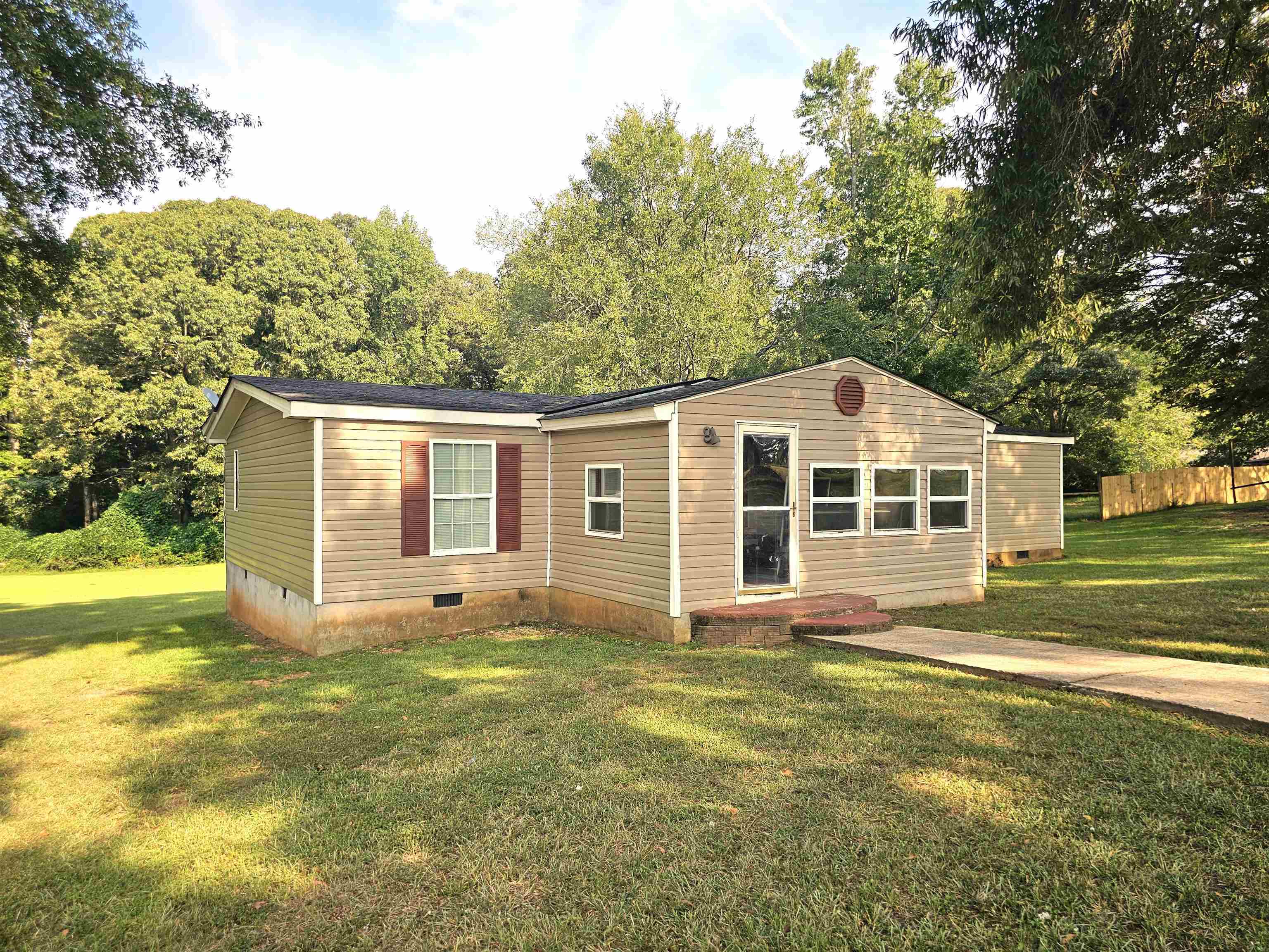 332 Moon Road Griffin, GA 30223 - Photo 1 of 1 a front view of a house with a yard