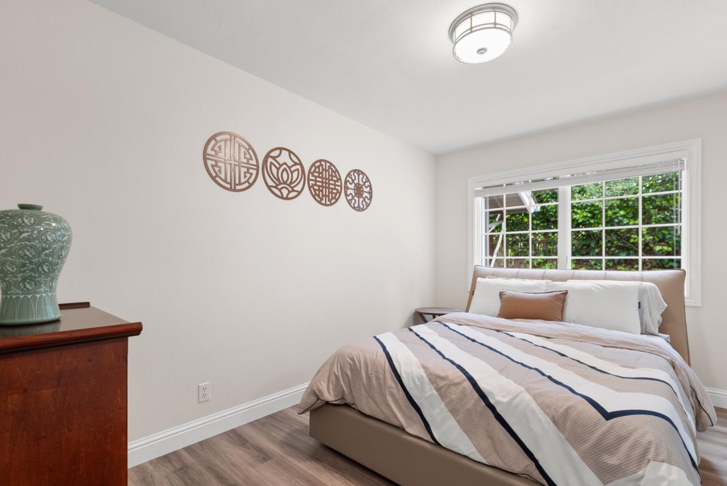 770 Graham Hill Road Santa Cruz, CA 95060 - Photo 51 of 83 a bedroom with a bed and a window