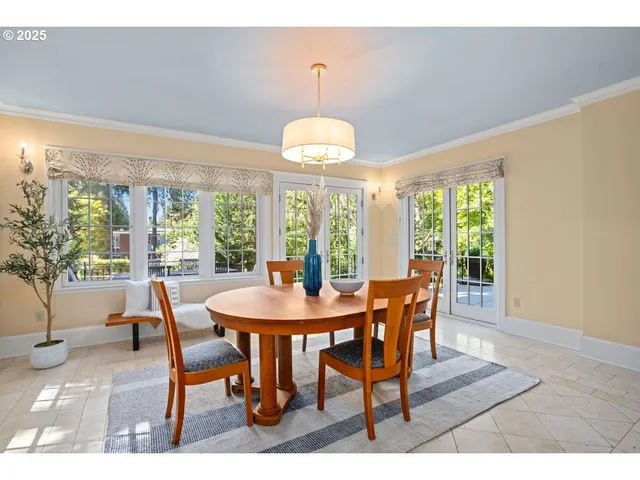 a kitchen with stainless steel appliances a stove a sink dishwasher and cabinets with wooden floor