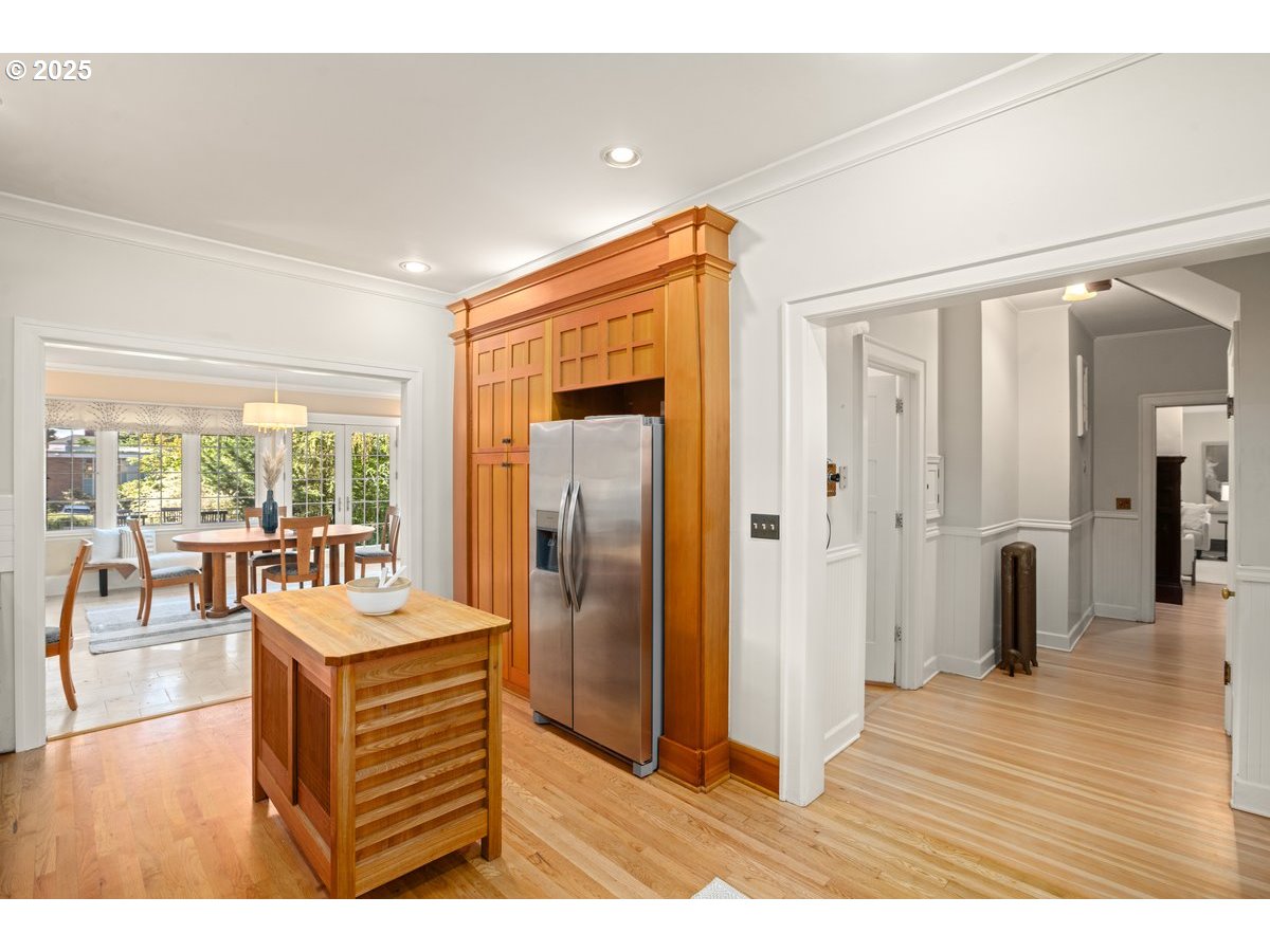 1314 Southeast 55th Avenue Portland, OR 97215 - Photo 24 of 47 a living room with stainless steel appliances kitchen island granite countertop furniture and a large window