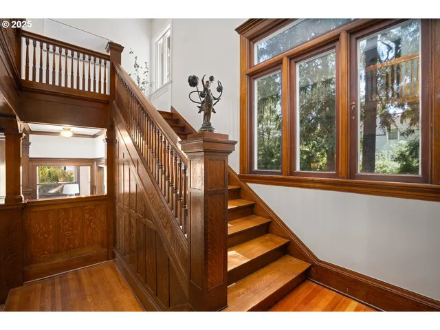 a view of entryway with wooden floor