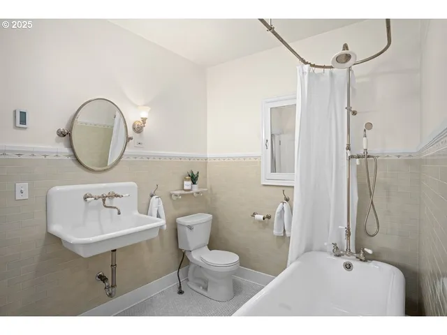 a bedroom with a bed and a fireplace