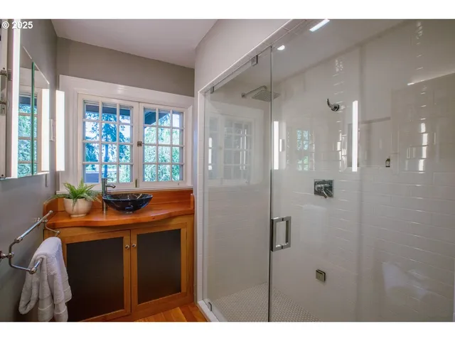 a kitchen view with granite countertop a sink and a stove