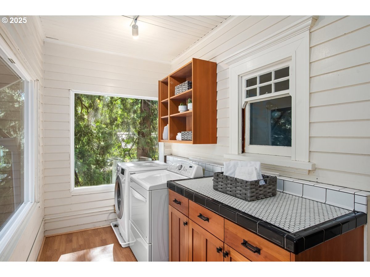 1314 Southeast 55th Avenue Portland, OR 97215 - Photo 40 of 47 a kitchen view with granite countertop a sink and a stove