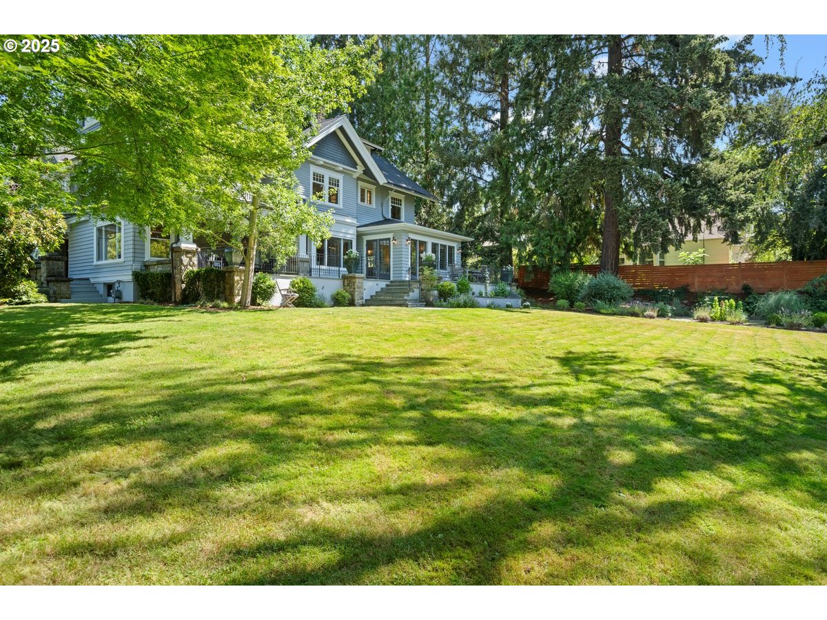1314 Southeast 55th Avenue Portland, OR 97215 - Photo 44 of 47 a front view of a house with a yard