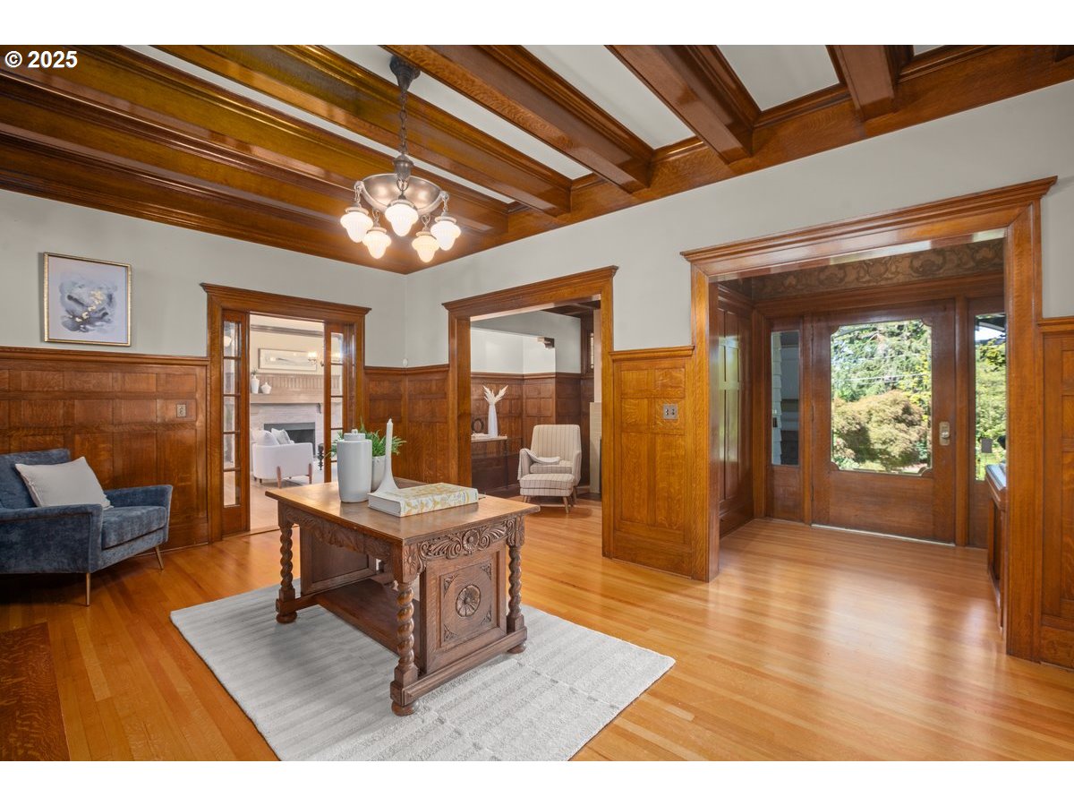 1314 Southeast 55th Avenue Portland, OR 97215 - Photo 8 of 47 a living room with furniture and a chandelier