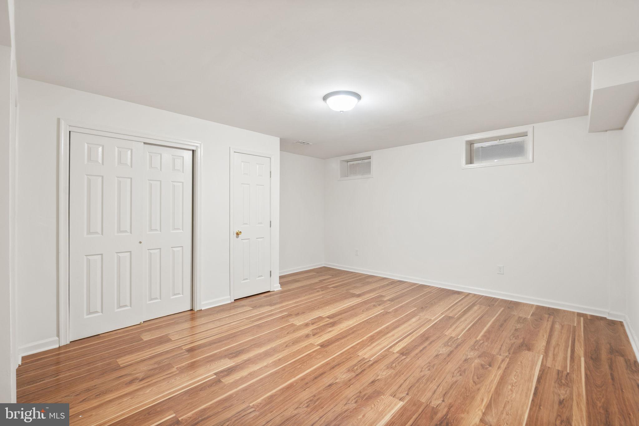 6528 Atkins Way Gainesville, VA 20155 - Photo 41 of 50 a view of empty room with wooden floor