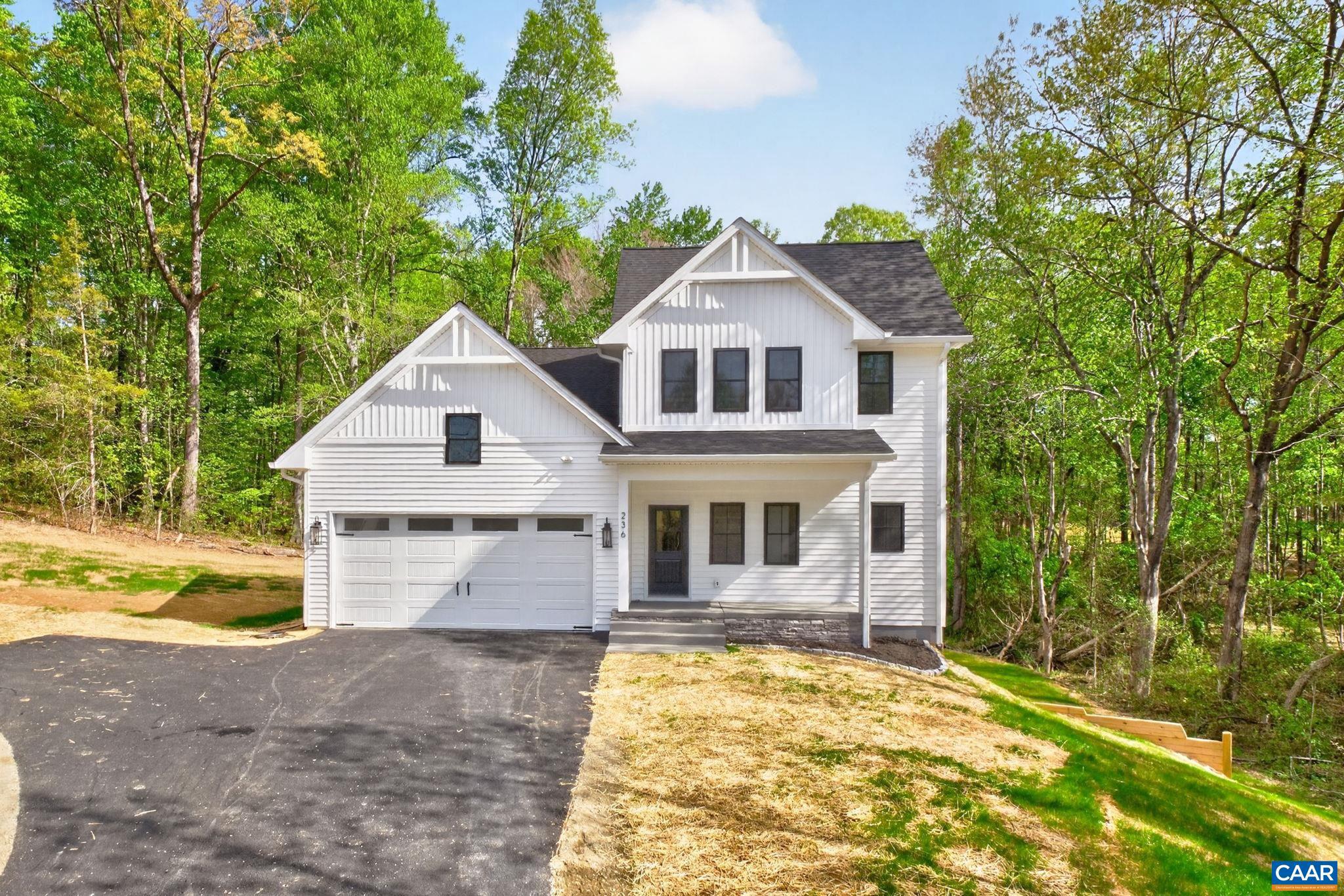 236 Palmer Place Ruckersville, VA 22968 - Photo 65 of 65 a front view of a house with a yard