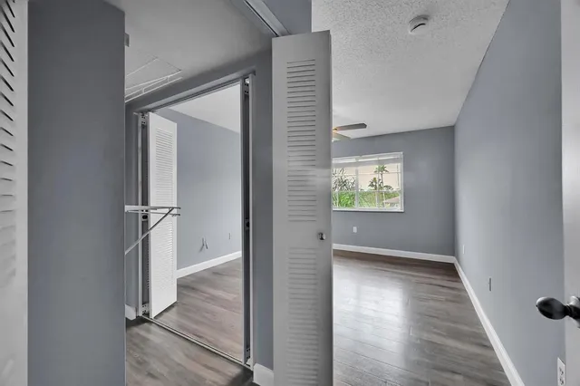 wooden floor in a hall with an entryway