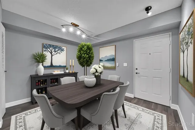 a view of a dining room with furniture