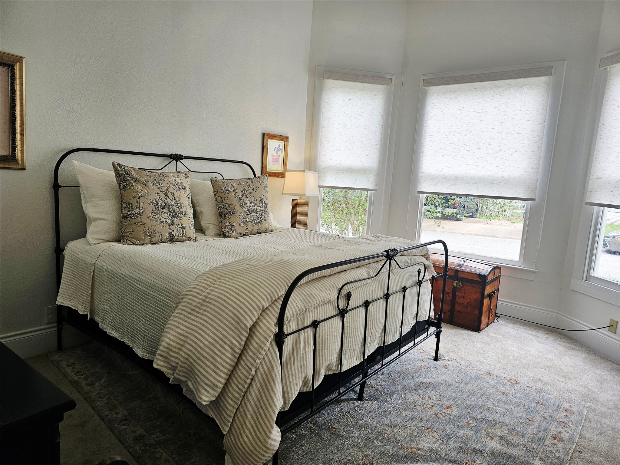 705 West 5th Street Brenham, TX 77833 - Photo 19 of 35 a bedroom with a bed and a window