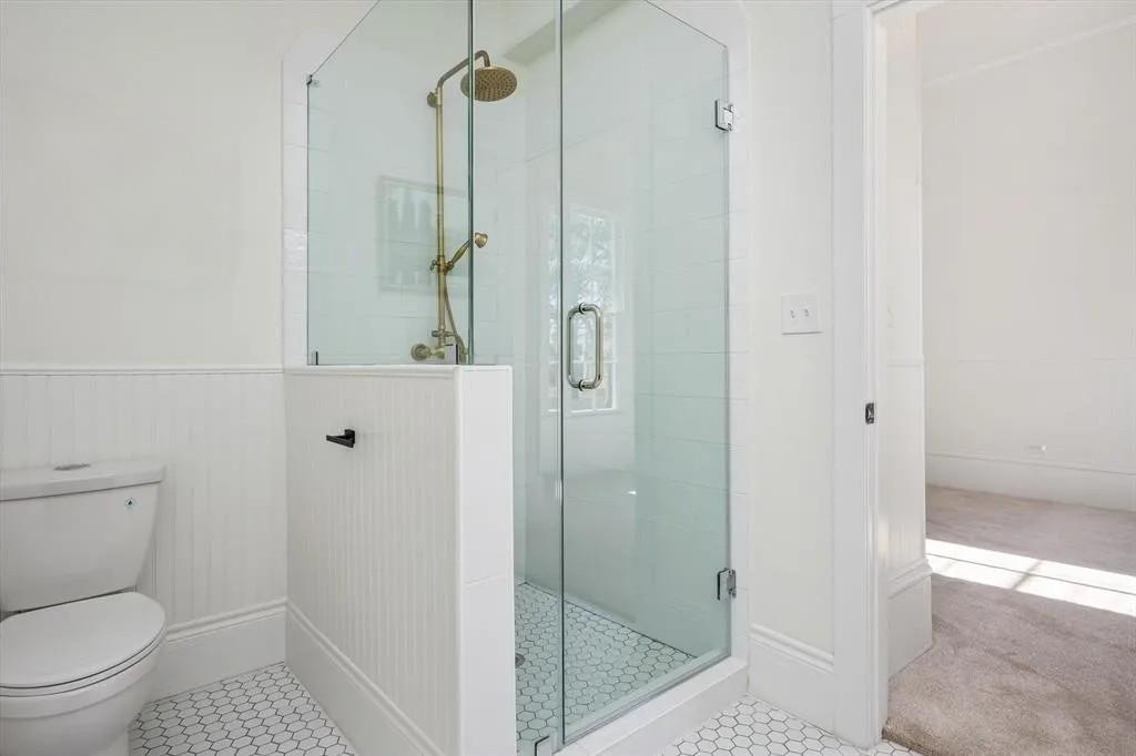 705 West 5th Street Brenham, TX 77833 - Photo 28 of 35 a bathroom with a shower and toilet
