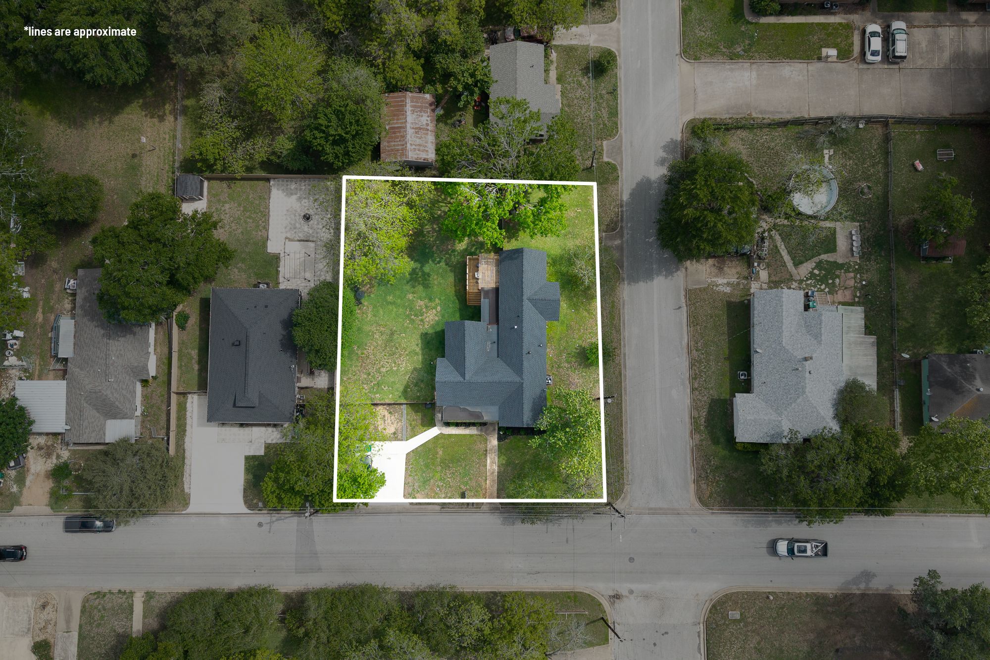705 West 5th Street Brenham, TX 77833 - Photo 34 of 35 an aerial view of a house having garden space