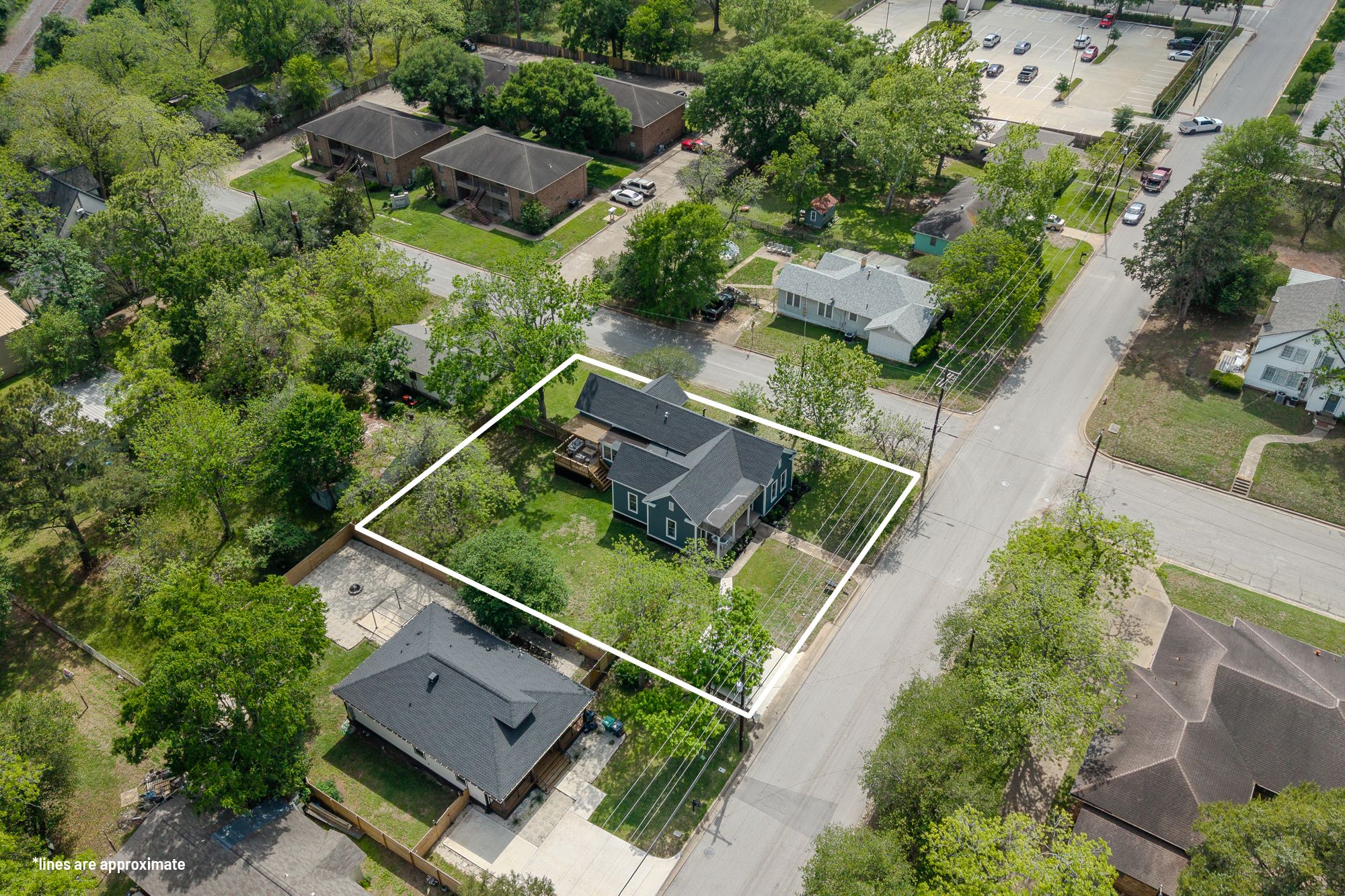 705 West 5th Street Brenham, TX 77833 - Photo 4 of 35 an aerial view of house with a yard