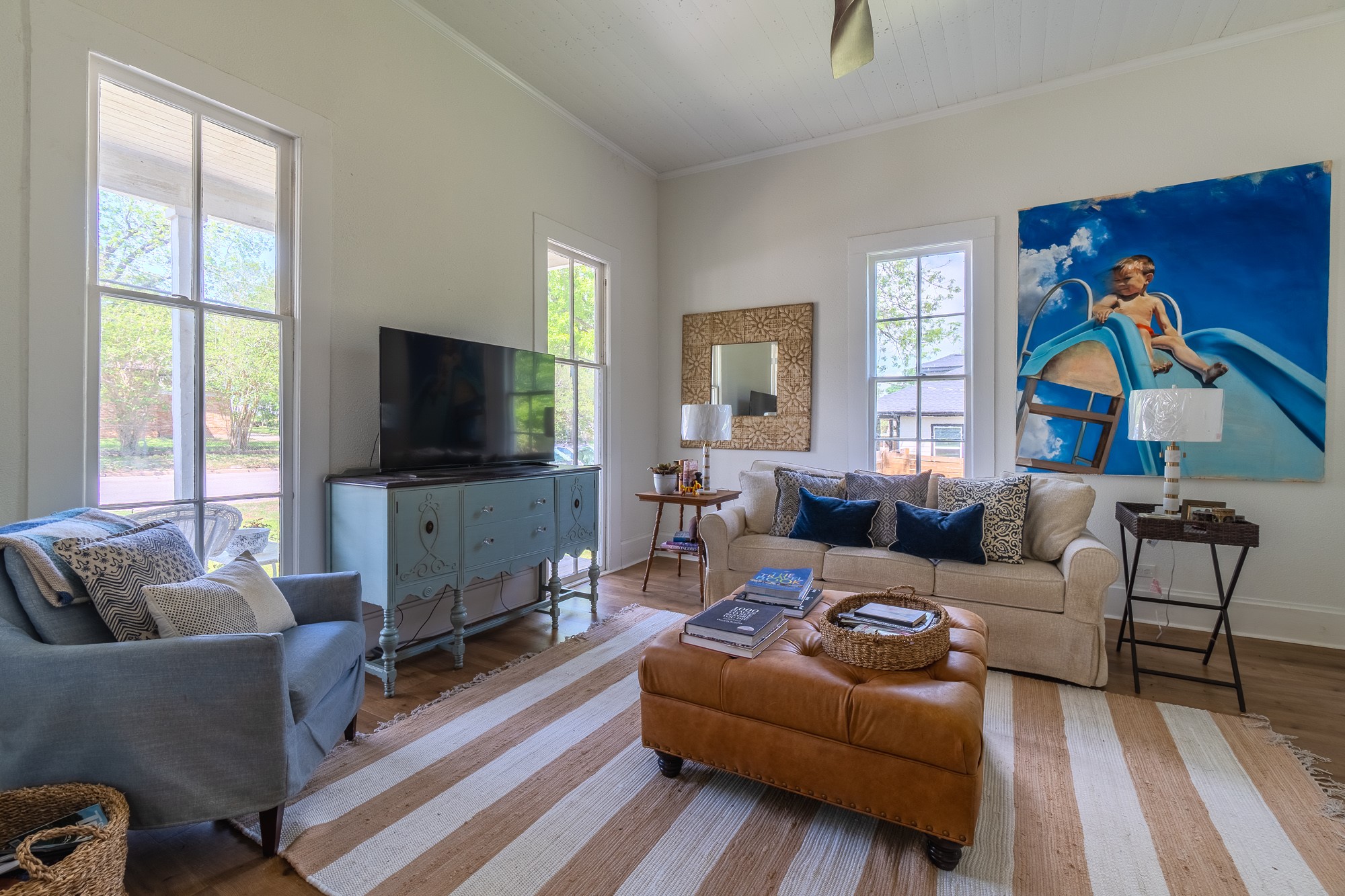 705 West 5th Street Brenham, TX 77833 - Photo 6 of 35 a living room with furniture and a flat screen tv