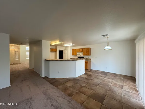 a view of a kitchen with a sink