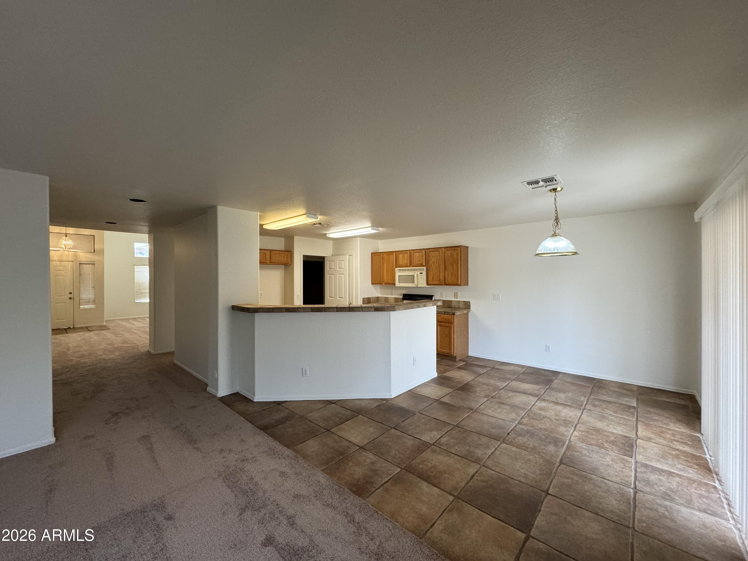 1126 East Shannon Street Gilbert, AZ 85295 - Photo 12 of 22 a view of a kitchen with a sink
