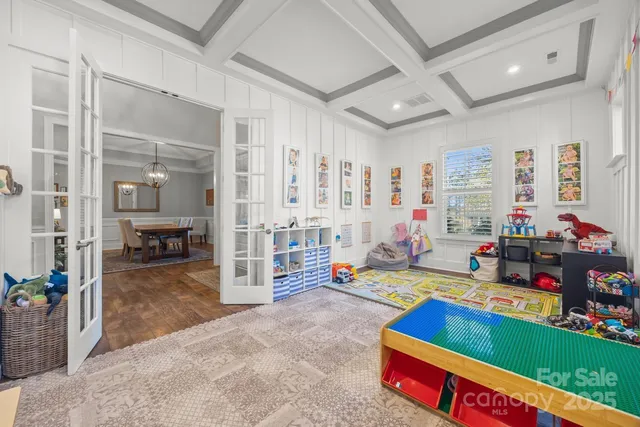 a very nice looking bedroom with a large window