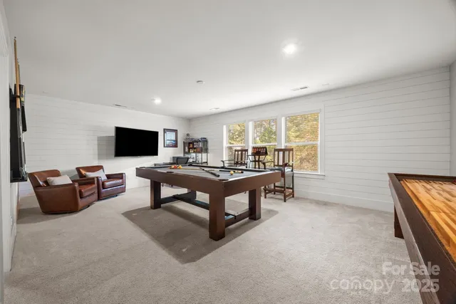 a view of a patio with a table and chairs in patio