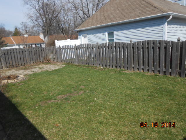 90 Long Beach Road Montgomery, IL 60538 - Photo 3 of 13 a view of a backyard