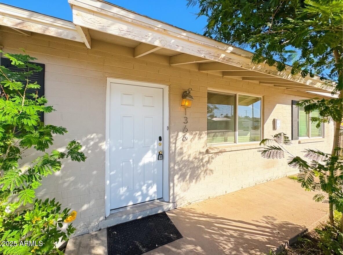 1366 West 15th Street Tempe, AZ 85281 - Photo 1 of 14 a view of a patio with wooden fence