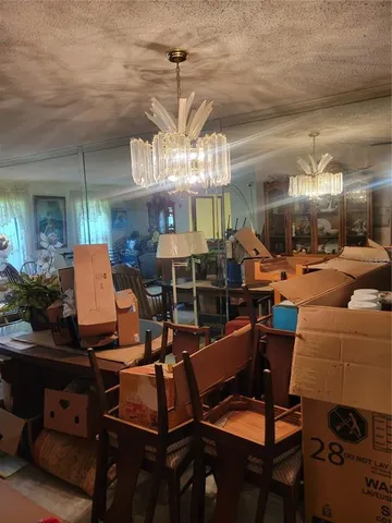 a view of a livingroom with furniture window and outside view