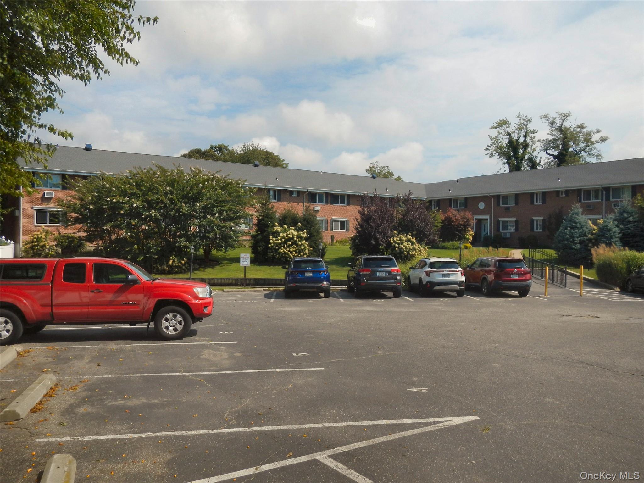 200 Merrick Road, Unit H Amityville, NY 11701 - Photo 7 of 36 front parking lot
