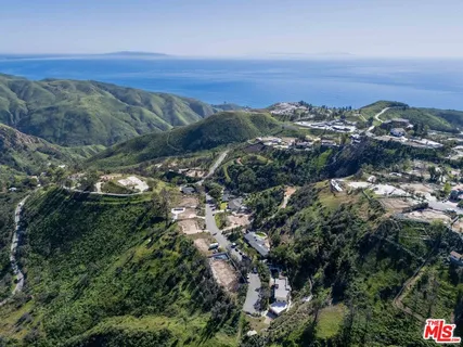 a view of city and mountain