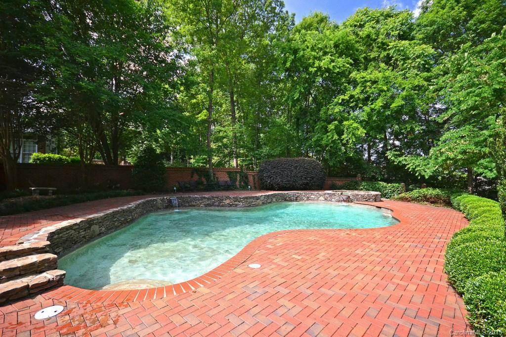4634 Binfords Ridge Road Charlotte, NC 28226 - Photo 22 of 24 a view of a backyard with large trees