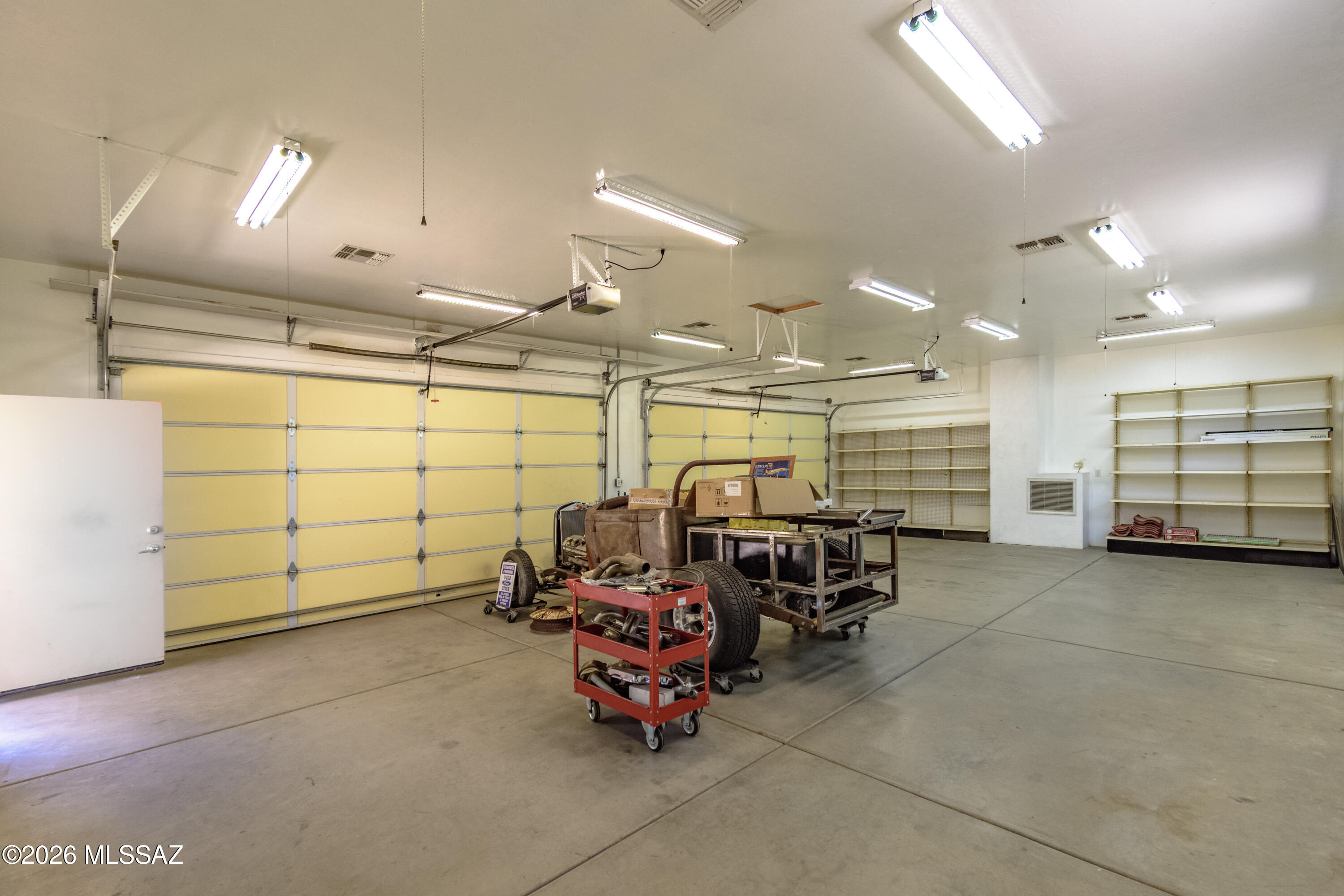 3002 West Oasis Road Tucson, AZ 85742 - Photo 39 of 49 AC Garage with Shelving 3002