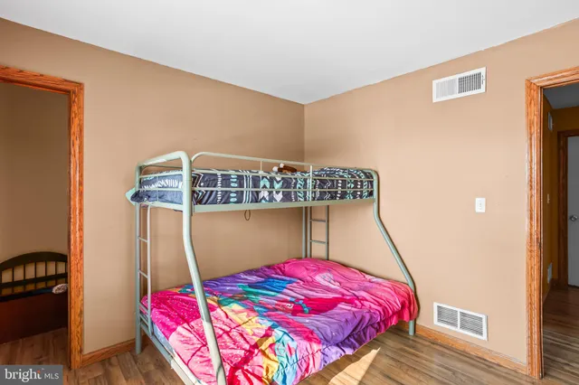a view of a livingroom with furniture and toys