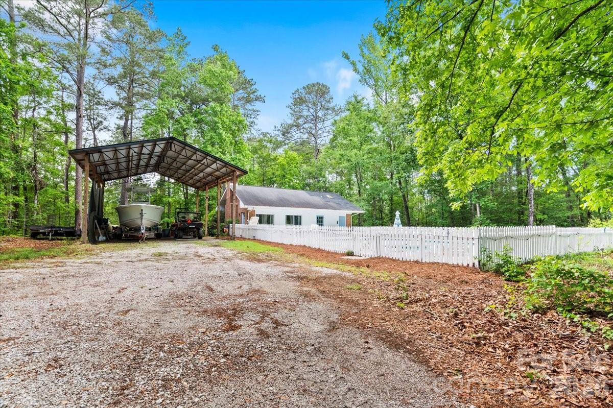 209 Fairway Road Cheraw, SC 29520 - Photo 34 of 48 a front view of a house with a yard