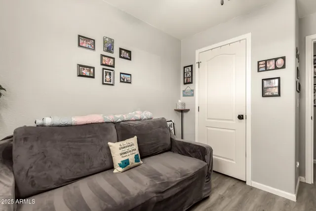 a room with furniture and a book shelf