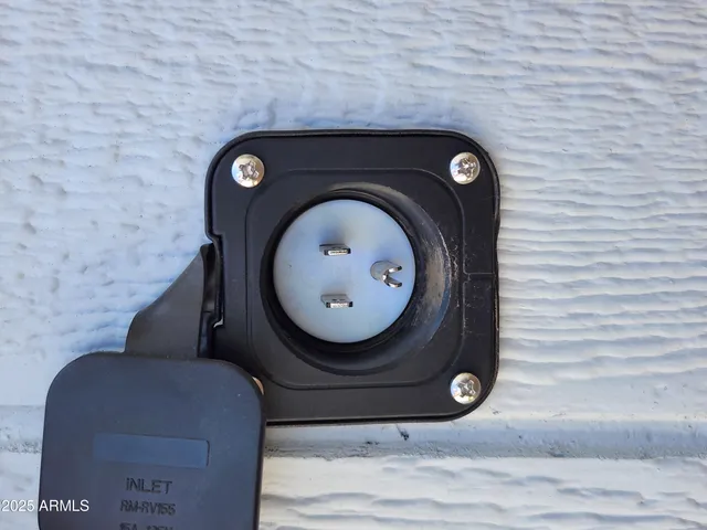 a bathroom with a mirror and a sink