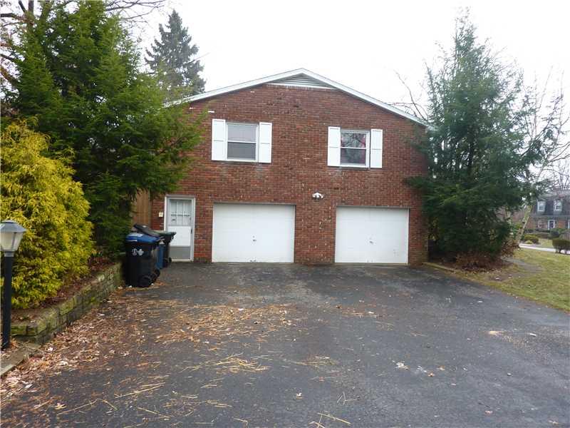 1989 Red Coach Road Allison Park, PA 15101 - Photo 18 of 18 Exterior Back. A wide level driveway leads to a large two-car garage.