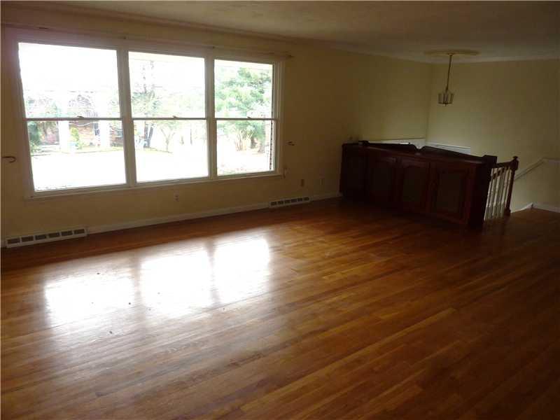 1989 Red Coach Road Allison Park, PA 15101 - Photo 5 of 18 Living Room. Hardwood graces the floors and neutral tones of the walls will match any furnishings.